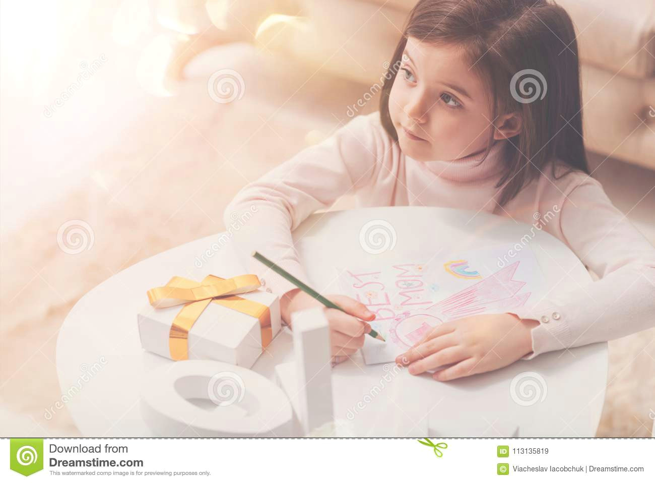 Drawing Of A Girl and Her Mom Caring Artistic Girl Making A Picture for Her Mom Stock Image