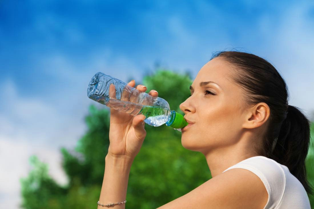 Drawing Of A Girl Drinking Water How Much Water Should I Drink Each Day